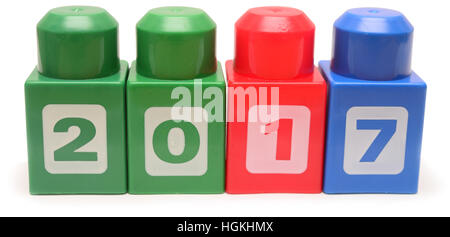 Colorful stacked toy plastic building blocks isolated on white background Stock Photo