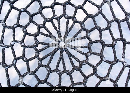 Rope texture of an swing chair seat in the snow Stock Photo