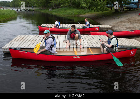 Men canoeing in Kejimkujik National Park and National Historic Site in Nova Scotia, Canada. Stock Photo