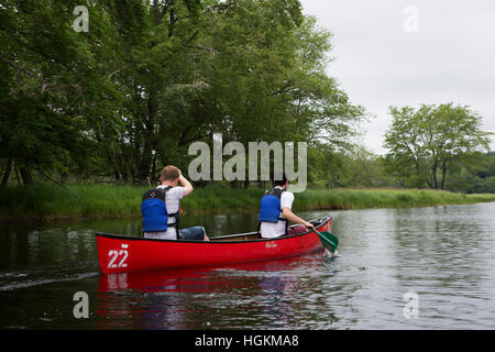 Men canoeing in Kejimkujik National Park and National Historic Site in Nova Scotia, Canada. Stock Photo