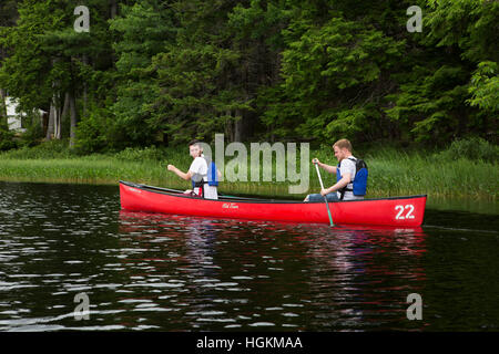 Men canoeing in Kejimkujik National Park and National Historic Site in Nova Scotia, Canada. Stock Photo