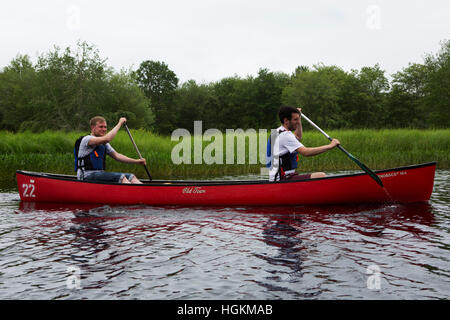 Men canoeing in Kejimkujik National Park and National Historic Site in Nova Scotia, Canada. Stock Photo