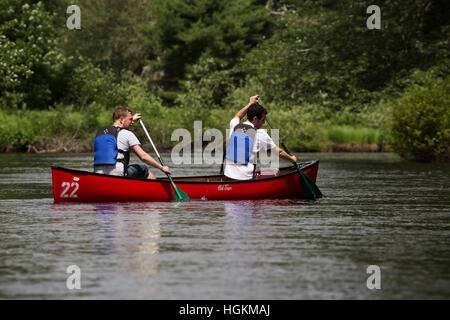 Men canoeing in Kejimkujik National Park and National Historic Site in Nova Scotia, Canada. Stock Photo