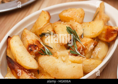 baked potatoes shot in artificial light Stock Photo