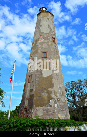 Old stone lighthouse on Bald Head Island North Carolina Stock Photo