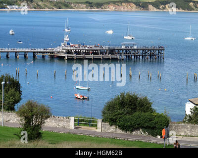 Remains of Old Pier, in front of the new Swanage Pier, Dorset, England Stock Photo