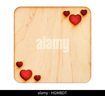 Wooden greeting card with scorched hearts with red paper inside, isolated on white background Stock Photo