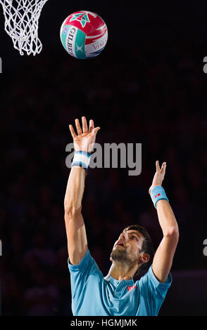 Melbourne, Australia. 11th Jan, 2017. Novak Djokovic of Serbia plays a charity match to raise funds for the Novak Djokovic Foundation ahead of Australian Open 2017 at Melbourne Park in Melbourne, Australia, Jan. 11, 2017. The Australian Open 2017 will take place in Melbourne from January 16 to 29. © Bai Xue/Xinhua/Alamy Live News Stock Photo