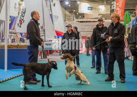 London, UK. 11th January 2017. Security is tightened with sniffer dog patrols of the show - HRH The Princess Royal, Princess Anne, And her husband Vice Admiral Tim Laurence, tour the London Boat Show 2017 at the Excel Centre. London 11 Jan 2017 © Guy Bell/Alamy Live News Stock Photo