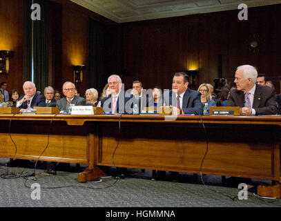 Washington, Us. 11th Jan, 2017. From left to right: former US Secretary of Defense Robert Gates, former US Senator Sam Nunn (Democrat of Georgia), Rex Wayne Tillerson, former chairman and chief executive officer of ExxonMobil, US Senator Ted Cruz (Republican of Texas) and US Senator John Cornyn (Republican of Texas) appear before the US Senate Committee on Foreign Relations as they consider the nomination of Tillerson to be Secretary of State of the US on Capitol Hill in Washington, DC on Wednesday, January 11, 2017. - NO WIRE SERVICE - Photo: Ron Sachs/Consolidated/dpa/Alamy Live News Stock Photo