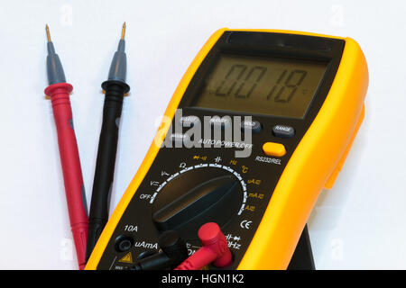 Digital multimeter with test leads connected  - isolated on white background Stock Photo