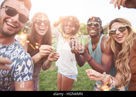 Group of friends with some sparklers Stock Photo
