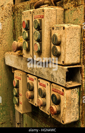 A close up of some control buttons within Clock House Brickworks, Capel, Near Dorking, Surrey, UK Stock Photo