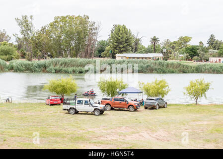 RITCHIE, SOUTH AFRICA - DECEMBER 24, 2016: Unidentified holidaymakers at the Riet River (reed river) at Ritchie, a small town in the Northern Cape Pro Stock Photo