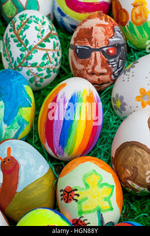 Detail of colorful, painted Easter eggs with different forms and animals. Stock Photo