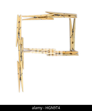 Letter P made of wooden clothespins isolated on white Stock Photo