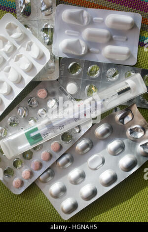 pills and thermometer  anti flu and cold Stock Photo