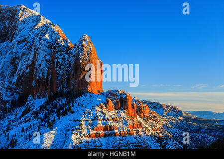 A late afternoon view of the majestic snow-covered rock formations in Kolob Canyons, a part of Zion National Park, Utah, USA. Stock Photo