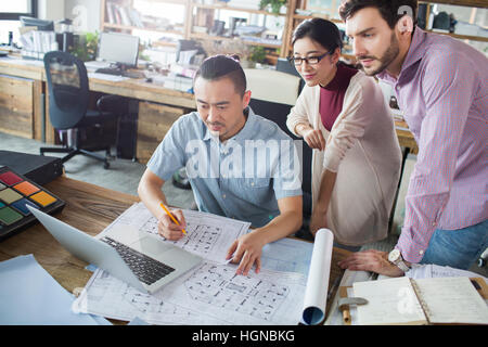 Architects working together in the office Stock Photo
