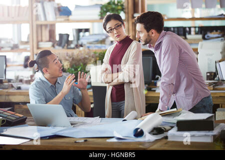 Architects talking in the office Stock Photo