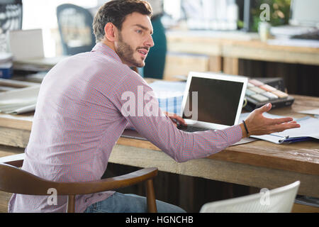 Male architect talking in the office Stock Photo