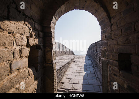 old dark stone tunnel inside great wall Stock Photo