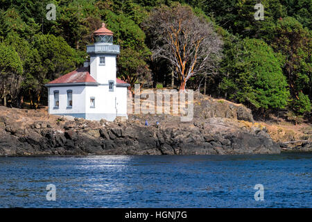 Lime Kiln Light. on San Juan Island, Washington, guides ships though the Haro Straits and is a part of Lime Kiln State Park. Stock Photo