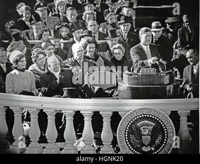 United States President John F. Kennedy delivers his Inaugural Address after being sworn-in as the 35th President of the United States on the East Front of the U.S. Capitol in Washington, D.C. on Friday, January 20, 1961. First Lady Jacqueline Kennedy, fo Stock Photo