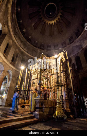 Jerusalem, Israel - July 13, 2014: Armenian priests hold traditional night mass in front of Ediculain, Church of Holy Sepulchre Stock Photo