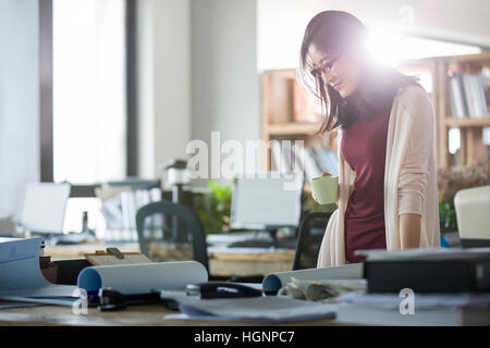 Female architect working in the office Stock Photo