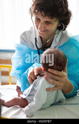 Pediatrician Examining Newborn Baby, Pediatrics. Hospital Policlinica 