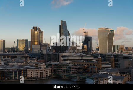 A winter's evening view of The Square Mile of City of London from the south bank of the River Thames Stock Photo