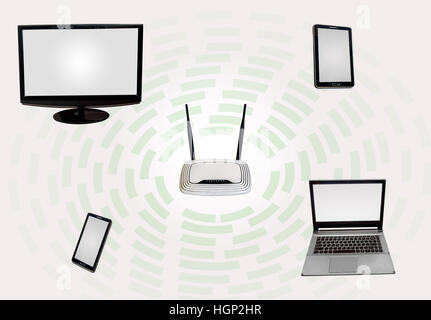 Wireless Internet connectivity zone with router desktop monitor laptop tab smart phone isolated in white. Stock Photo