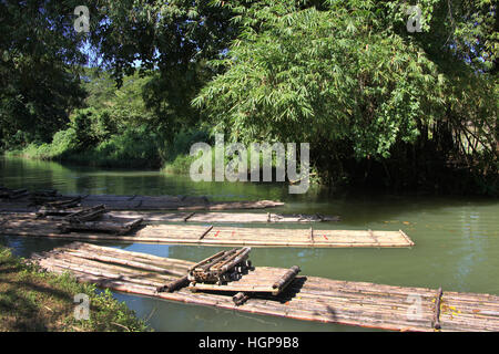 Bamboo rafts on the Martha Brae river, popular tourist day trip, Falmouth, Jamaica. Close to Montego Bay & Ocho Rios. Stock Photo