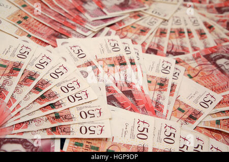 Great Britain £50  - fifty pounds sterling notes. Money spread out. Stock Photo