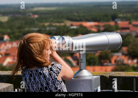 A child looking at the view from the church Ribe, Denmark. Stock Photo