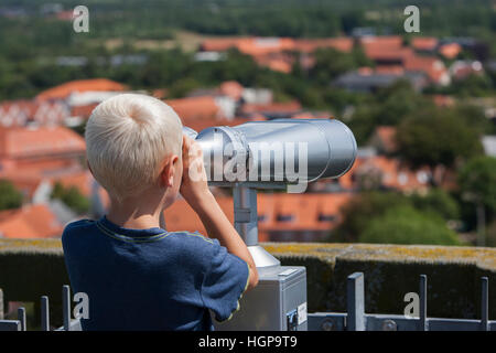 A child looking at the view from the church Ribe, Denmark. Stock Photo