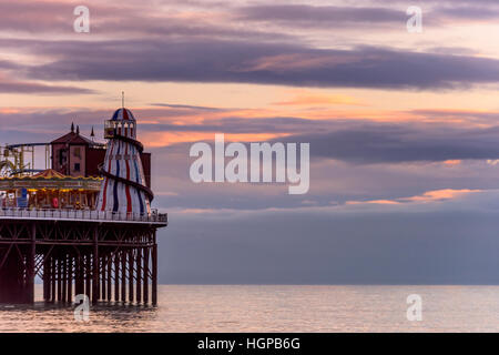 Brighton's Palace Pier at sunset Stock Photo