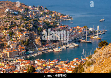 Looking down on the harbor in yialos on Symi Greece Stock Photo