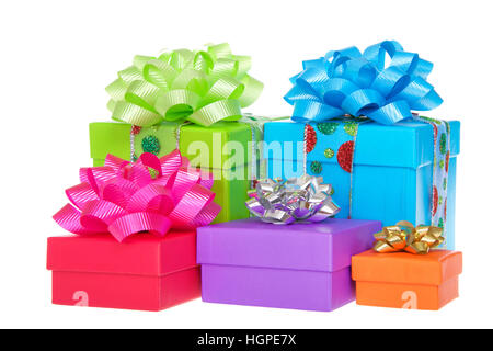 Many brightly colored boxes presents with colorful bows. Holiday shopping wrapped. Isolated on a white background. Stock Photo