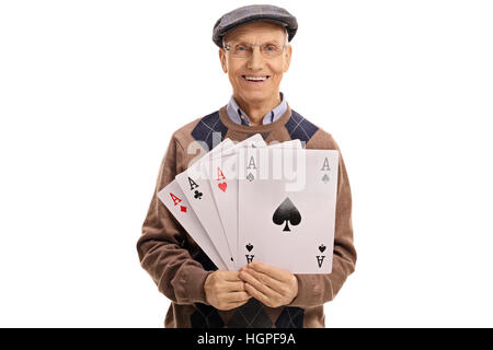 Cheerful mature man holding four aces isolated on white background Stock Photo