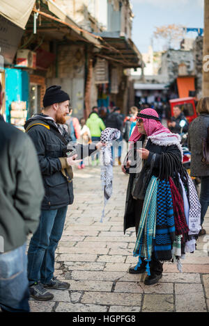 Street vendor scarves shop within the Christian Quarter in Jerusalem, Israel, also known as the Muristan Stock Photo