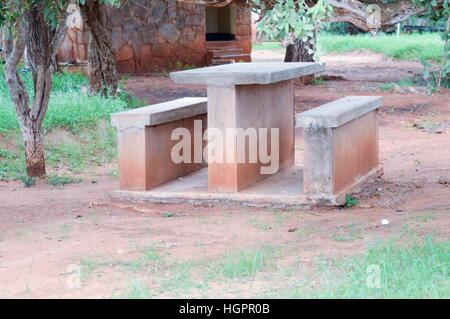 Benches and concrete table in East Tsavo Park, Kenya Stock Photo