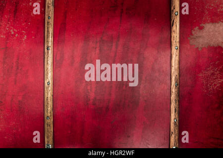 Detail background of an old vintage red brown suitcase with wooden strips for protection (copy space) Stock Photo