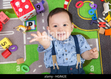 Portrait of smiling baby boy Stock Photo