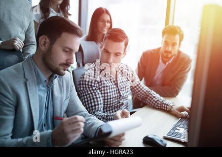 IT colleagues working on software development project in office Stock Photo