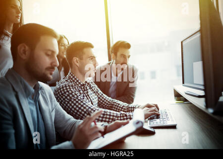IT colleagues working on software development project in office Stock Photo