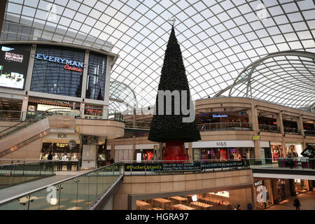 02/12/16, Leeds, UK. A Christmas tree and festive decorations adorn the Trinity shopping centre in Leeds, West Yorkshire. As December arrives in UK sh Stock Photo