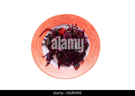 Appetizer for dinner. Plate with vegetables salad on white background. Isolated with clipping path Stock Photo