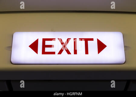 EXIT door sign on an Airbus A320 airplane Air plane aeroplane aircraft Stock Photo